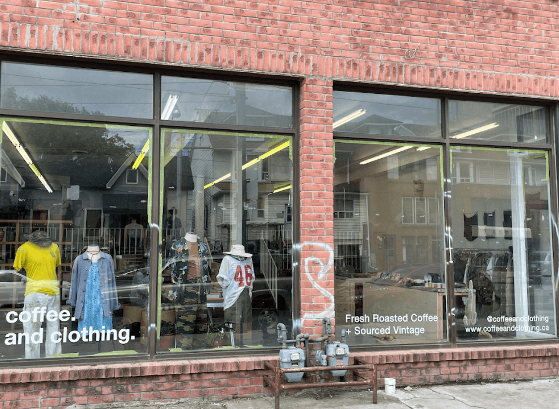 Coffee and Clothing vintage store interior in Toronto showing curated vintage clothing displays and organized inventory management systems.
